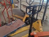 many different types of pallets in a warehouse