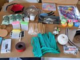 a table with a lot of craft supplies on it