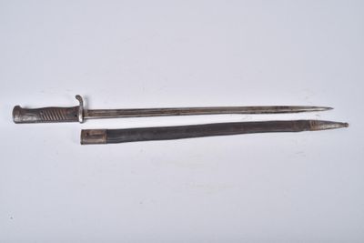 two tools that are sitting on a white surface