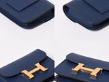 four pieces of blue leather wallets with gold hardware