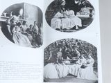 an open book with pictures of people sitting around a table