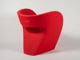 an image of a red chair sitting on top of a white surface