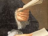 a painting of a man reading a book on a table