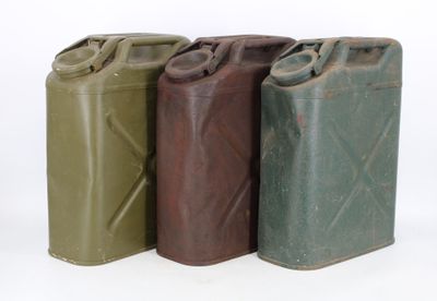 three green, brown, and black jerry cans on a white background
