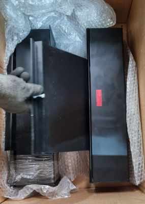 a box that has a laptop inside of it