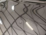 a black and white vase sitting on top of a table