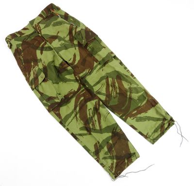 a close up of a pair of camouflage pants on a white surface