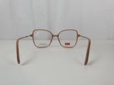 a close up of a pair of glasses on a white surface