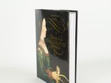 an image of a book with a picture of a woman in a green dress