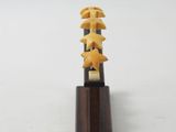 wooden sculpture of five stars on a wooden stand