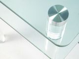 a glass table with a glass top and a metal base
