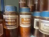 many jars of food that are sitting on a shelf