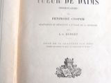 un livre ouvert sur lequel figure l'image d'un château