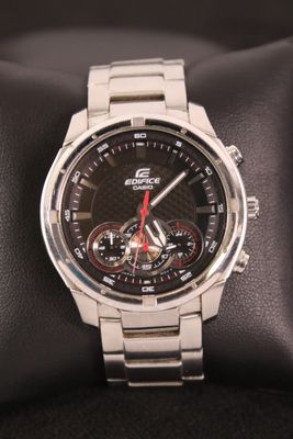 a close up of a wrist watch on a watch case