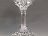 a wine glass that is sitting on a table