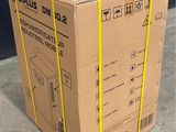 a cardboard box that is sitting on the ground
