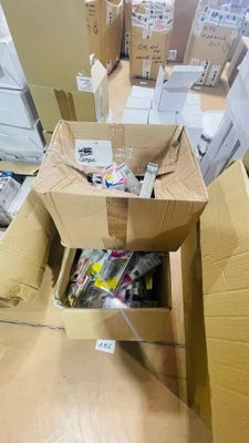 many boxes that are sitting on the floor in the room