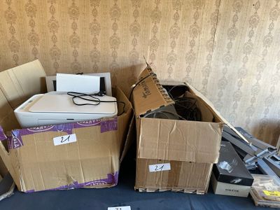 many boxes of electronic equipment sitting on a table