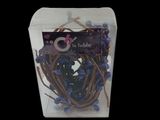 a box with a bunch of purple flowers inside of it
