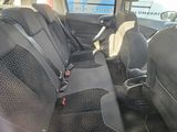the back seats of a car are black with black trims