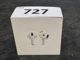 a white box with a pair of earphones in it
