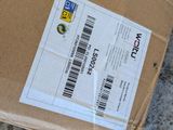 a box with a price label on it sitting on the ground