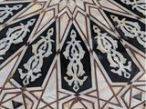 an image of a black and white floor with a star design