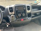 a dashboard of a truck with a steering wheel