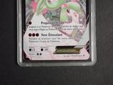 a close up of a pokemon card on a table