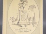 un vieux livre sur lequel figure le dessin d'un vase contenant des fleurs