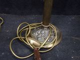 a lamp that is sitting on a table next to a pair of scissors
