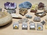 many different types of rocks and stones on the table
