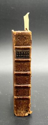 a miniature book that is sitting on a table