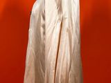 an image of a mannequin wearing a white coat