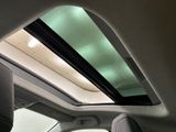 a view of the inside of a car with a sunroof
