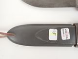 two knives that are laying next to each other on a table
