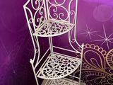 a white shelf with a chair on it in front of a purple wall