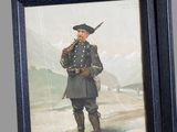 three framed pictures of a man in a military uniform holding a gun