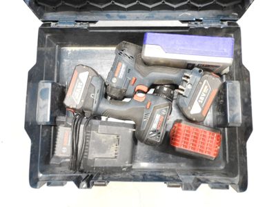 two cordless drillets in a case with tools in it