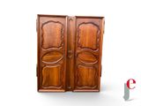 pair of antique french walnut armoires with carved doors