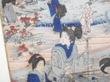 a picture of a woman sitting on a boat in the water