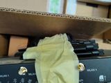 a box full of electronic equipment sitting on top of a table