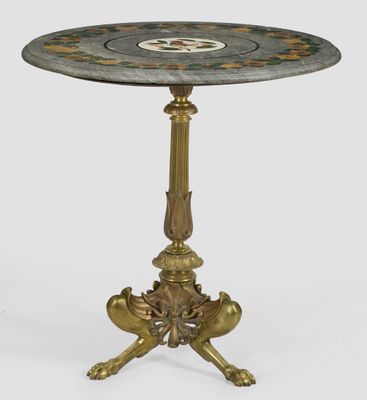 a small table with a marble top on a pedestal