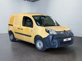 a yellow van that is parked in a room