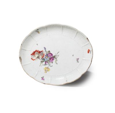 an image of a plate with a flower design on it