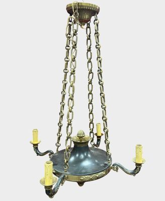 an image of a chandelier with candles hanging from it ' s ceiling