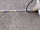 a close up of a bicycle handle on the ground