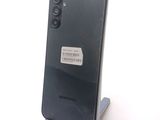 a close up of a cell phone with a barcode on it