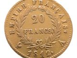 une image représentant une pièce d'or sur laquelle figure le chiffre vingt