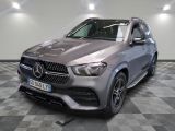 the mercedes gle suv is parked on a checkered floor